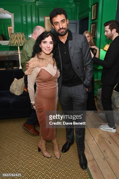 Maria Jose Bavio and Cyrill Ibrahim attend Alistair Guy's birthday cocktail party at Hackett London, Savile Row, on December 8, 2023 in London,...