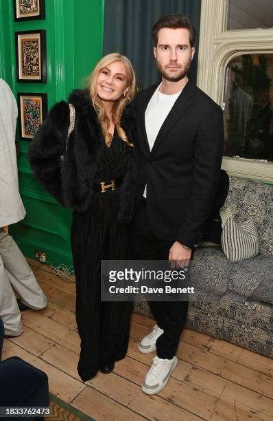 Helena Hillberg and Michael Hillberg attend Alistair Guy's birthday cocktail party at Hackett London, Savile Row, on December 8, 2023 in London,...