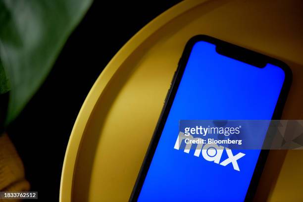 The Max logo on a smartphone arranged in New York, US, on Friday, Dec. 8, 2023. Independent film company A24 will run its new movies exclusively on...