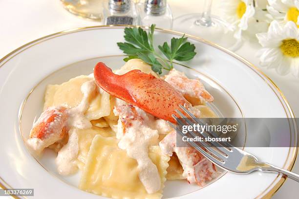 dinner of tasty lobster ravioli - lobster seafood stock pictures, royalty-free photos & images