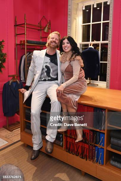 Alistair Guy and Maria Jose Bavio attend Alistair Guy's birthday cocktail party at Hackett London, Savile Row, on December 8, 2023 in London, England.