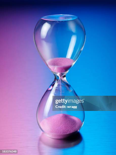 glass sand timer - hourglass stock pictures, royalty-free photos & images