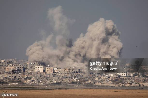 An explosion is seen over Gaza, viewed from Israel on December 8, 2023 in the Southern border, Israel. It has been more than two months since the...