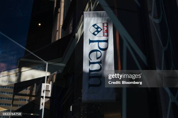 Banner for the University of Pennsylvania on campus in Philadelphia, Pennsylvania, US, on Friday, Dec. 8, 2023. Penn was sued by a pair of students...