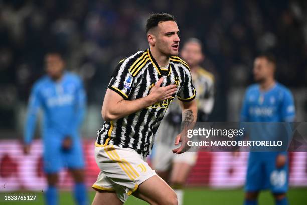 Juventus' Italian defender Federico Gatti celebrates after scoring the team's first goal during the Italian Serie A football match between Juventus...