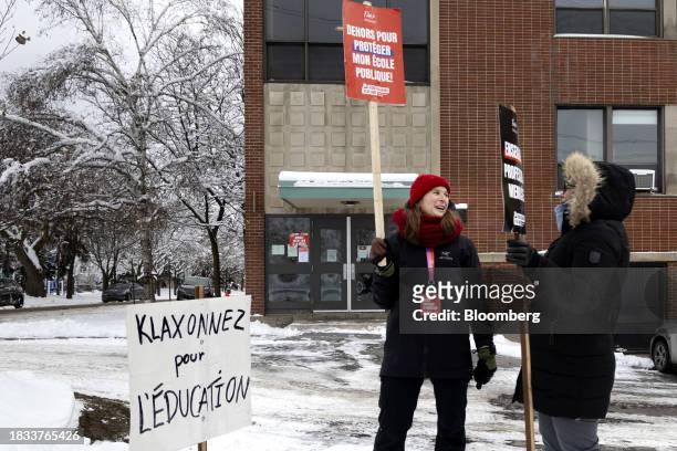 Public sector workers during a strike outside the Champlain Adult Education Centre in Montreal, Quebec, Canada, on Friday, Dec. 8, 2023. As many as...