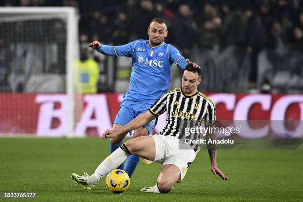 Stanislav Lobotka , of Napoli, is tackled by Federico Gatti , of Juventus, during the Italian Serie A football match between Juventus and Napoli at...