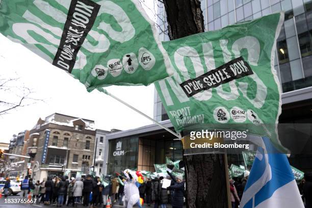 Public sector workers and supporters during a strike outside the Centre hospitalier de l'Universite de Montreal hospital in Montreal, Quebec, Canada,...