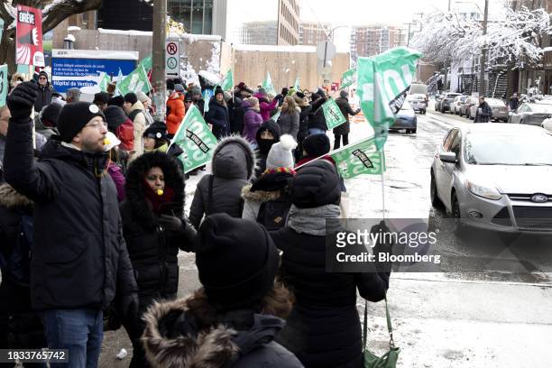 Public sector workers and supporters during a strike outside the Verdun Hospital in Montreal, Quebec, Canada, on Friday, Dec. 8, 2023. As many as...