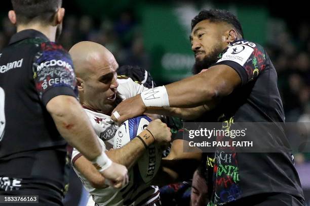 Bordeaux-Begles' French scrum-half Maxime Lucu and Connacht's Irish centre Bundee Aki compete for the ball during the European Champions Cup Pool 1...