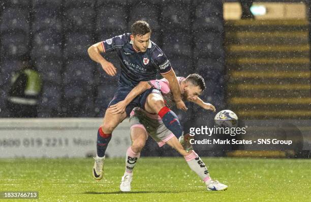 Raith's Jamie Gullan and Partick Thistle's Steven Lawless in action during a cinch Championship match between Raith Rovers and Partick Thistle at...