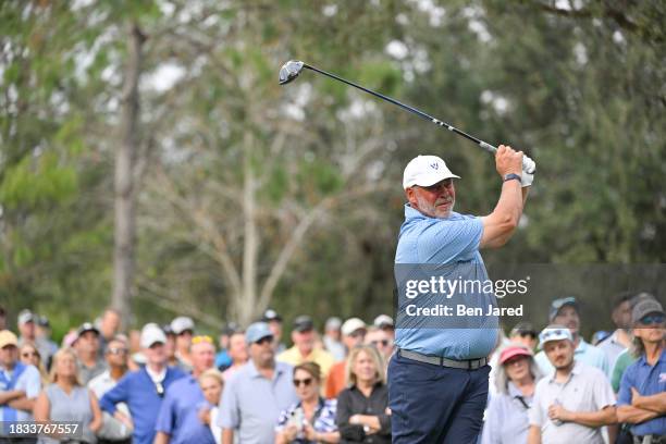 Darren Clarke of Northern Ireland tees off on the ninth hole during day two of afternoon Scotch Sixsome at the World Champions Cup at The Concession...