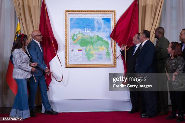 President of the National Assembly Jorge Rodriguez unveils an updated map of Venezuela annexing Guyana's Essequibo Region to Venezuela at the...