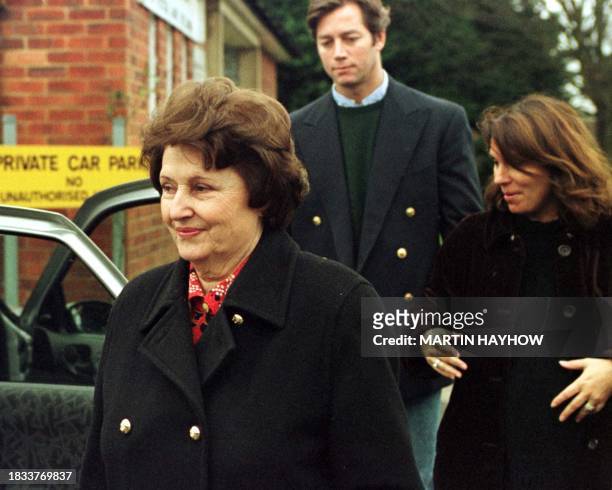 Lucia Pinochet , wife of former Chilean dictator General Augusto Pinochet, and her daughter Jacqueline Noguera , leave 20 January the Catholic Church...
