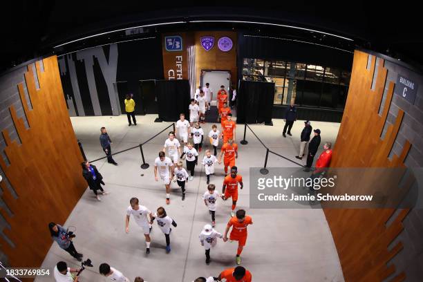 The West Virginia Mountaineers prepare to take on the Clemson Tigers during the Division I Men's Soccer Semifinals held at the Lynn Family Stadium on...