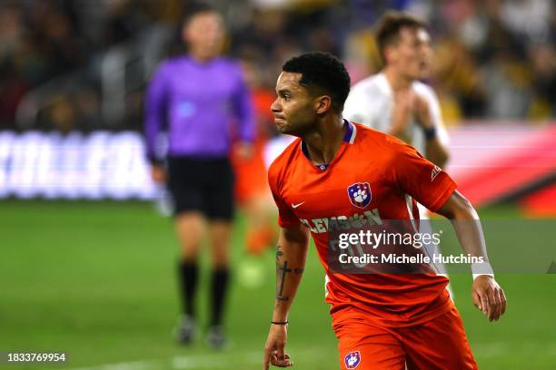 Shawn Smart of the Clemson Tigers celebrates after scoring the first goal of the game against the West Virginia Mountaineers during the Division I...