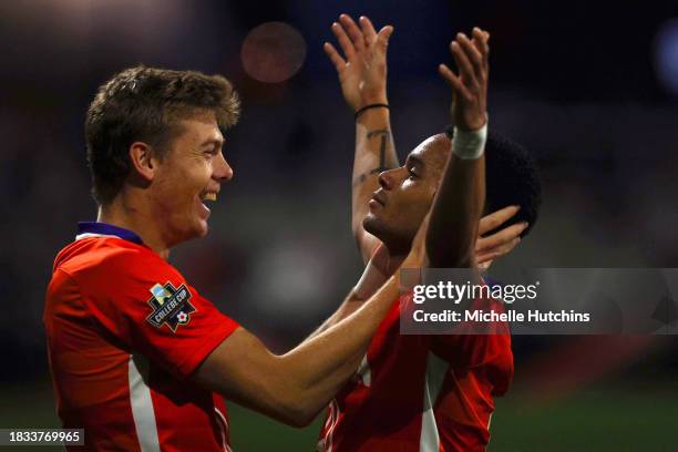 Shawn Smart of the Clemson Tigers celebrates after scoring the first goal of the game against the West Virginia Mountaineers during the Division I...