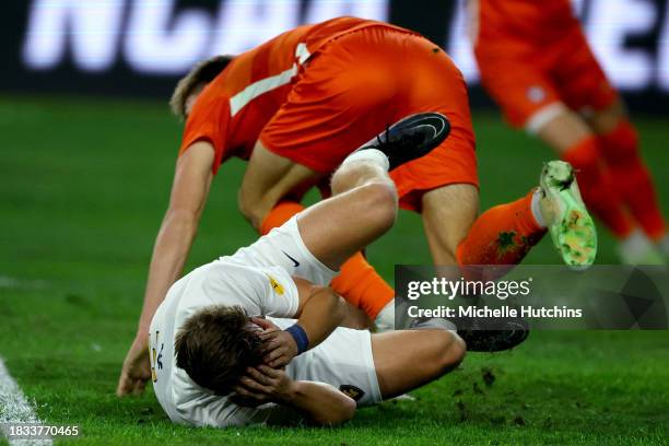 Frederik Jorgensen of the West Virginia Mountaineers reacts to a hard hit against the Clemson Tigers during the Division I Men's Soccer Semifinals...