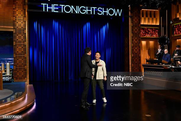 Episode 1887 -- Pictured: Host Jimmy Fallon with comedian Fumi Abe during Goodnights & Credits on Friday, December 8, 2023 --
