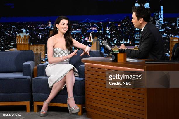 Episode 1887 -- Pictured: Actress Anne Hathaway during an interview with host Jimmy Fallon on Friday, December 8, 2023 --