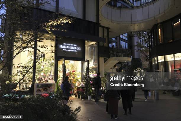 Stores decorated with Christmas lights in the Marunouchi area of Tokyo, Japan, on Friday, Japan, on Dec. 8, 2023. Inflation data are well above the...