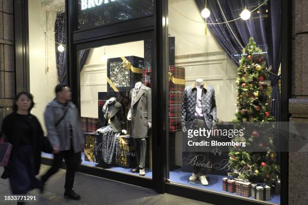 Christmas tree at the window display of a Brooks Brothers store in the Marunouchi area of Tokyo, Japan, on Friday, Japan, on Dec. 8, 2023. Inflation...