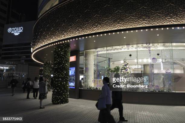 Christmas tree in a window display in the Yurakucho area of Tokyo, Japan, on Friday, Japan, on Dec. 8, 2023. Inflation data are well above the Bank...