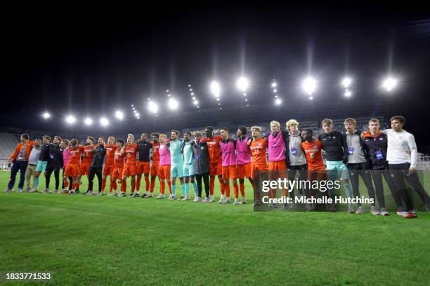 The Clemson Tigers celebrate after defeating the West Virginia Mountaineers during the Division I Men's Soccer Semifinals held at the Lynn Family...