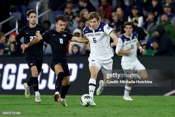 Wyatt Lewis of the Notre Dame Fighting Irish and Pere Belmonte of the Oregon State Beavers battle for the ball during the Division I Men's Soccer...