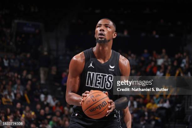 Harry Giles III of the Brooklyn Nets shoots a free throw during the game against the Washington Wizards on December 8, 2023 at Barclays Center in...