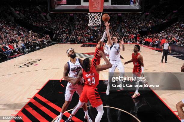 Luka Doncic of the Dallas Mavericks shoots the ball during the game against the Portland Trail Blazers on December 8, 2023 at the Moda Center Arena...
