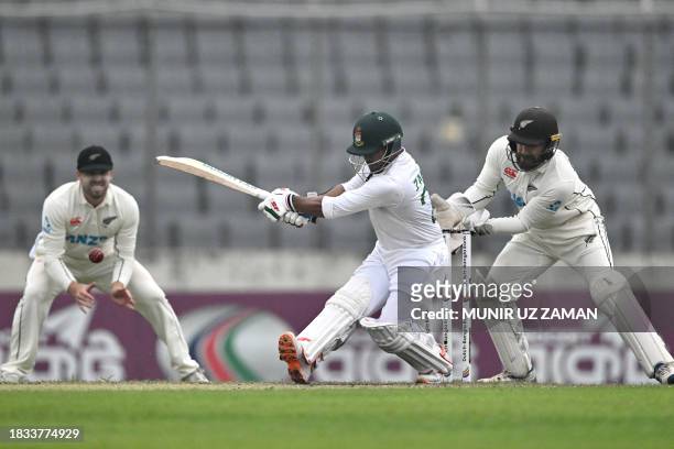 Bangladesh's Zakir Hasan plays a shot during the fourth day of the second Test cricket match between Bangladesh and New Zealand at the Sher-e-Bangla...