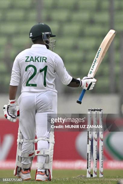 Bangladesh's Zakir Hasan celebrates after scoring a half-century during the fourth day of the second Test cricket match between Bangladesh and New...