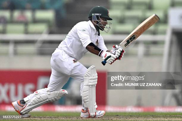 Bangladesh's Zakir Hasan watches the ball after playing a shot during the fourth day of the second Test cricket match between Bangladesh and New...