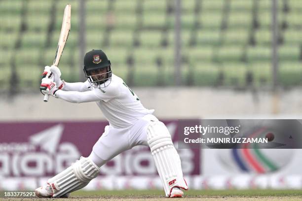 Bangladesh's Mehidy Hasan Miraz plays a shot during the fourth day of the second Test cricket match between Bangladesh and New Zealand at the...