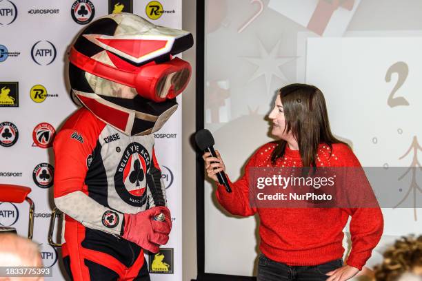 Belle Vue Mascot Chase The Ace is being ''interviewed'' by Belle Vue meeting presenter Hayley Bromley during the Belle Vue Speedway Christmas Cracker...