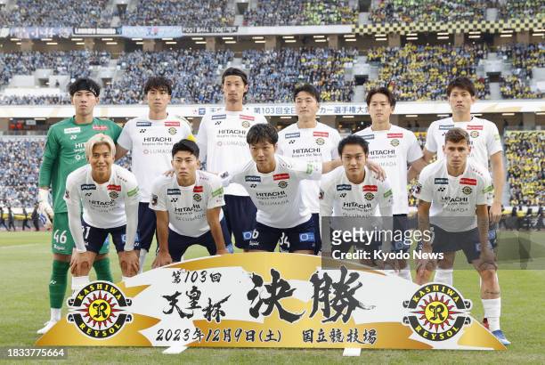 Kashiwa Reysol players pose for a team photo ahead of the Emperor's Cup football final against Kawasaki Frontale on Dec. 9 at Tokyo's National...