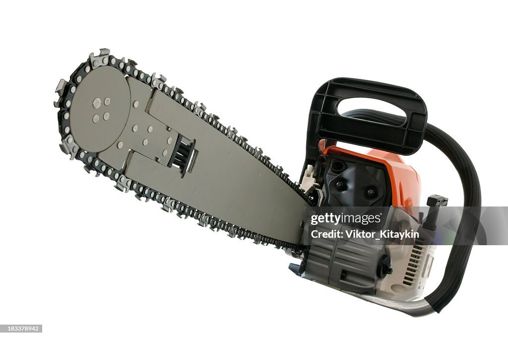 Close-up of chain saw isolated on white background