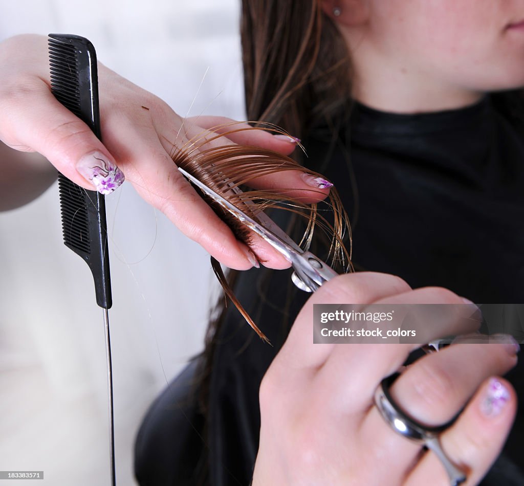 Woman cutting hair