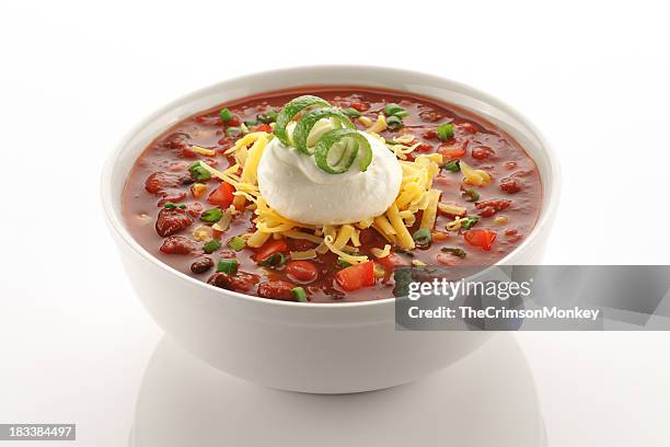 close of up vegetarian chili in white bowl - chili bowl stock pictures, royalty-free photos & images