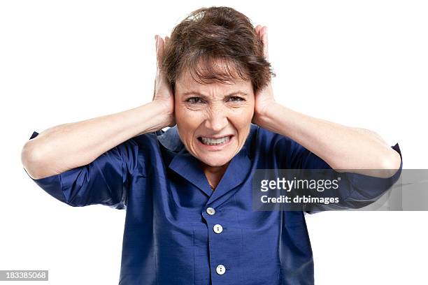 mature female portrait - covering ears stock pictures, royalty-free photos & images