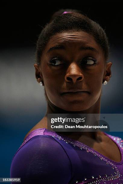Simone Biles of USA looks on before she competes in the Vault Final on Day Six of the Artistic Gymnastics World Championships Belgium 2013 held at...