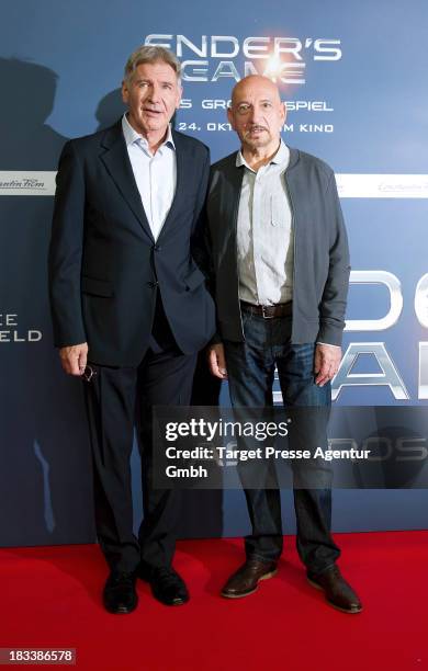 Actors Sir Ben Kingsley and Harrison Ford attend the 'Ender's Game' Photocall at Hotel Adlon on October 6, 2013 in Berlin, Germany.