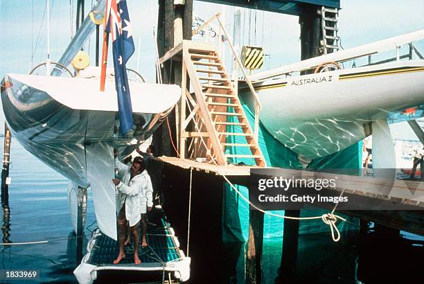 The Australian II Team shrouds the Australia II's controversial keel from inspection before the America's Cup race 1983 held in Newport,USA in 1983.