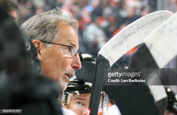 Head Coach of the Philadelphia Flyers John Tortorella speaks with a Referee during a timeout against the New Jersey Devils at the Wells Fargo Center...