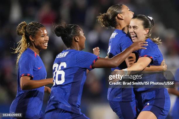 Sam Coffey of the United States celebrates scoring with teammates during the second half against China PR at Toyota Stadium on December 05, 2023 in...