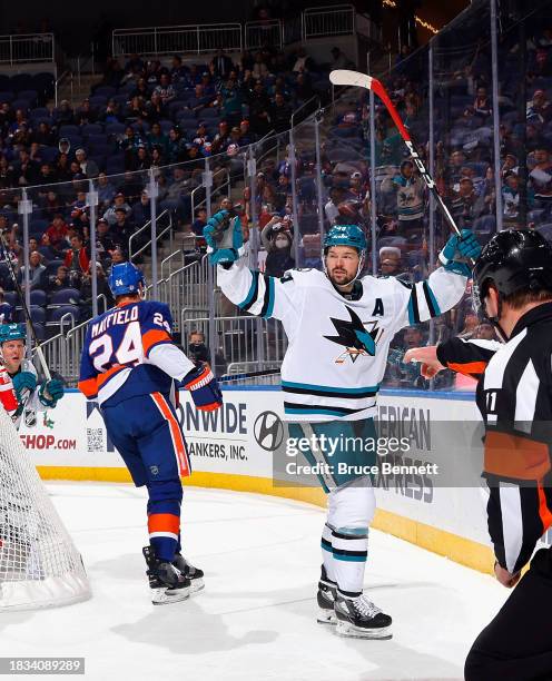 Tomas Hertl of the San Jose Sharks scores at 16:49 of the third period against the New York Islanders at UBS Arena on December 05, 2023 in Elmont,...