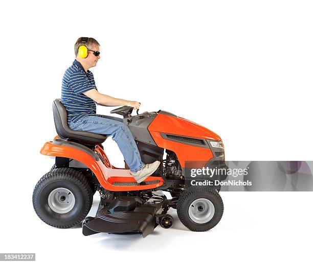 man on a mower - lawn mower stock pictures, royalty-free photos & images