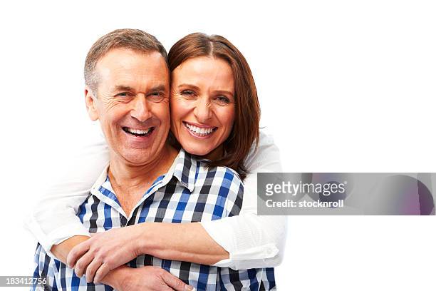 mature couple isolated on white background hugging - white teeth stock pictures, royalty-free photos & images