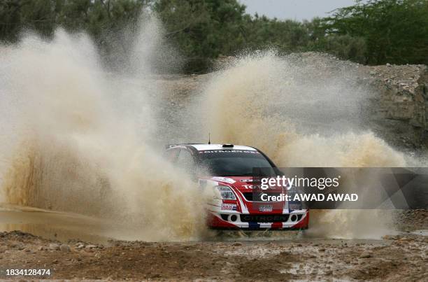 Four-time world champion Sebastien Loeb and co-driver Daniel Elena power their Citroen C4 through the start of the 2008 Jordan Rally in the Dead Sea...